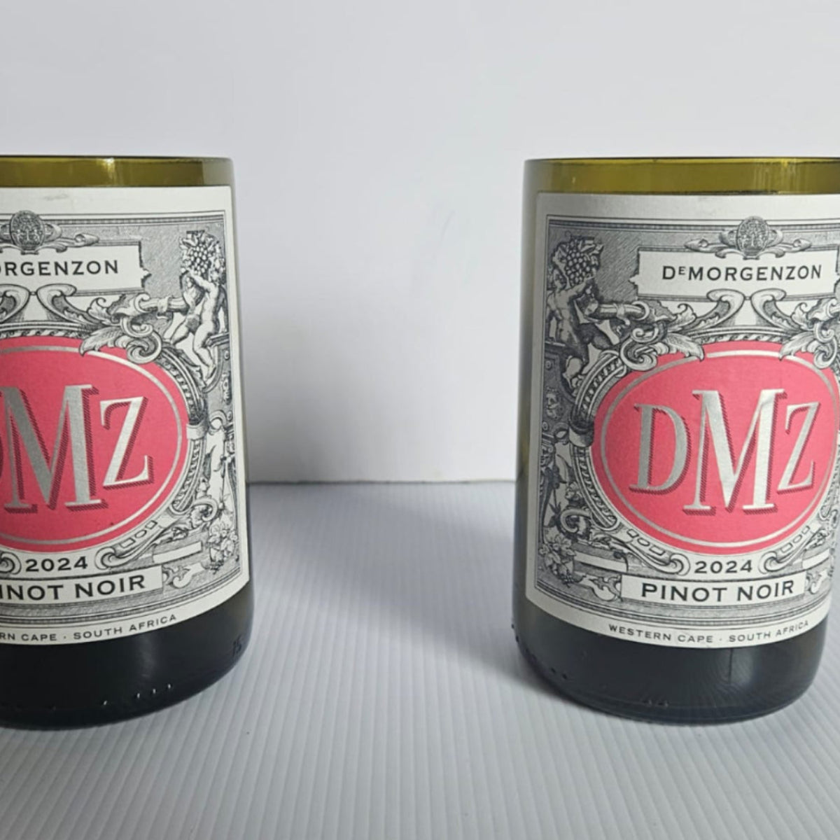 Bespoke handcrafted cut and ground DMZ wine bottles